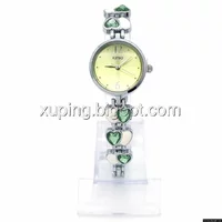 Часы KIMIO под серебро, браслет в сердечки с зелеными камнями, длина 21см, циферблат 23мм